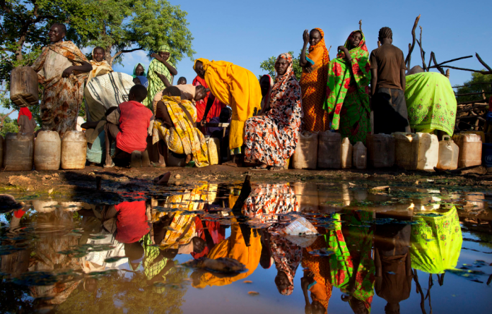Water shortages in South Sudan force residents to rely on water vendors.